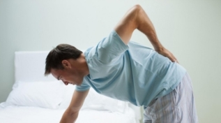 how does lumbar spine osteochondrosis manifest itself